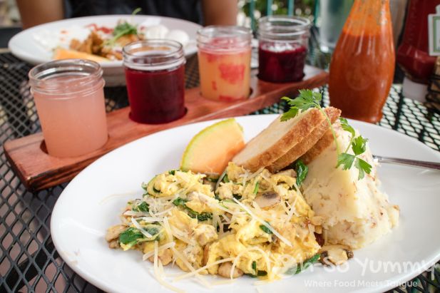 Tres Egg Scramble and mimosa flight at Parkhouse Eatery in San Diego